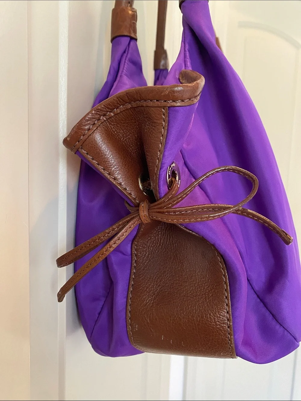 kate spade vibrant purple nylon shoulder bag with brown leather handles